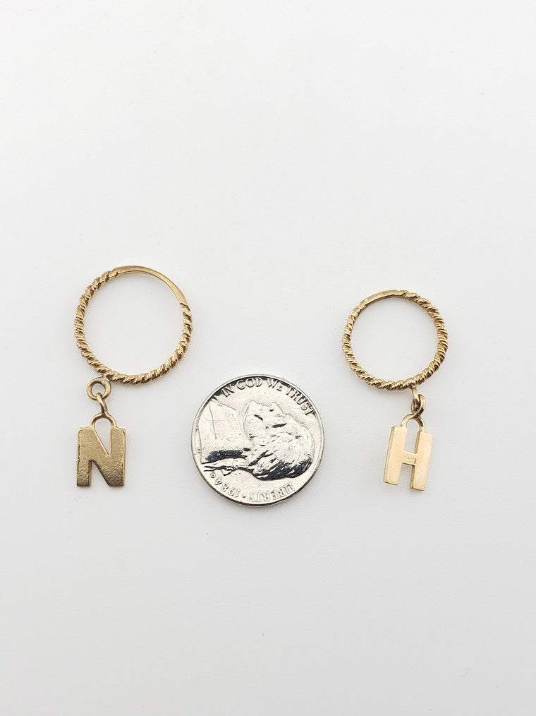 Initial Dangle Rings