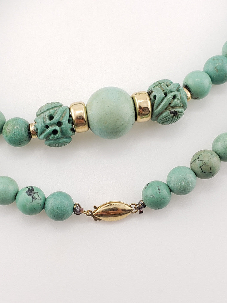Carved Turquoise Strand 24"