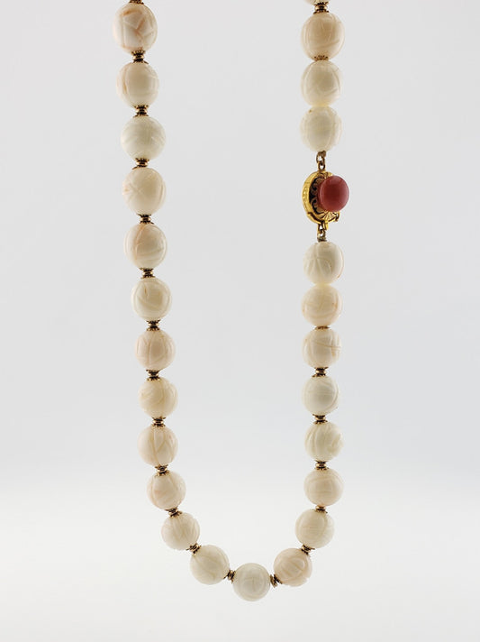 Carved Coral Strand 16.5”