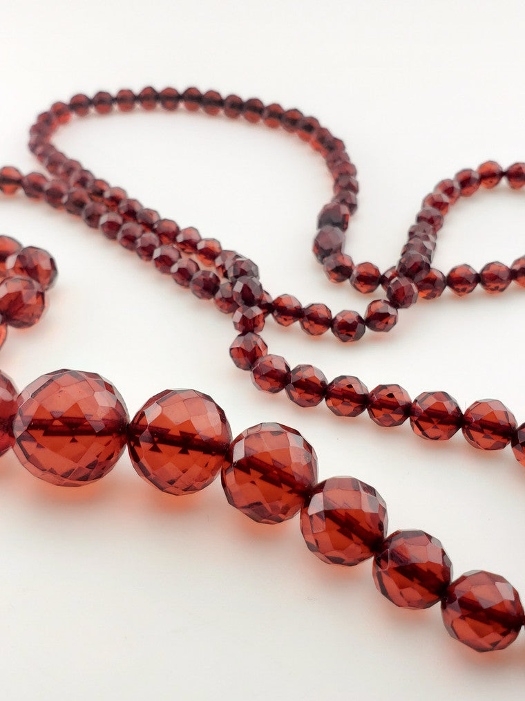 Antique Faceted Graduating Amber Strand