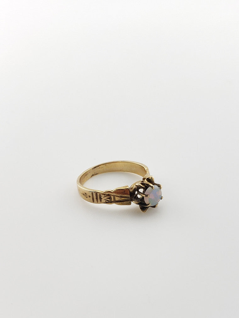 Opal Claw Solitaire Ring