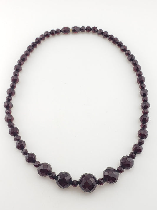 Antique Faceted "Cherry" Amber Strand