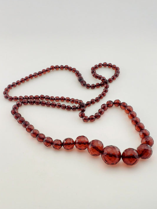 Antique Faceted Graduating Amber Strand