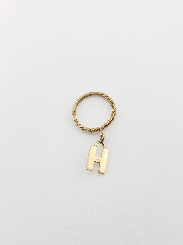 Initial Dangle Rings