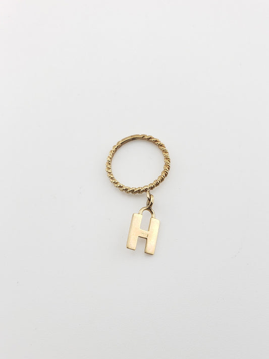 Initial Dangle Rings